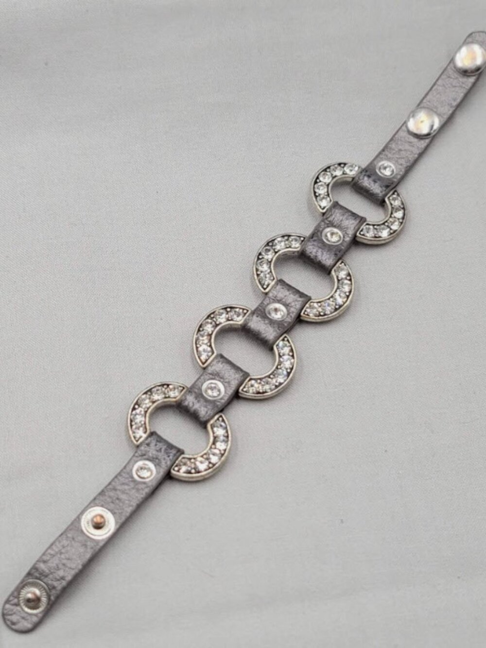 Guang Tong Silver Leather Bracelet w/ Adjustable Button Closures